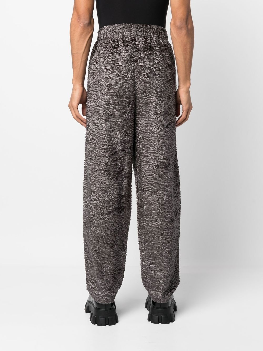 all-over graphic-print trousers - 5