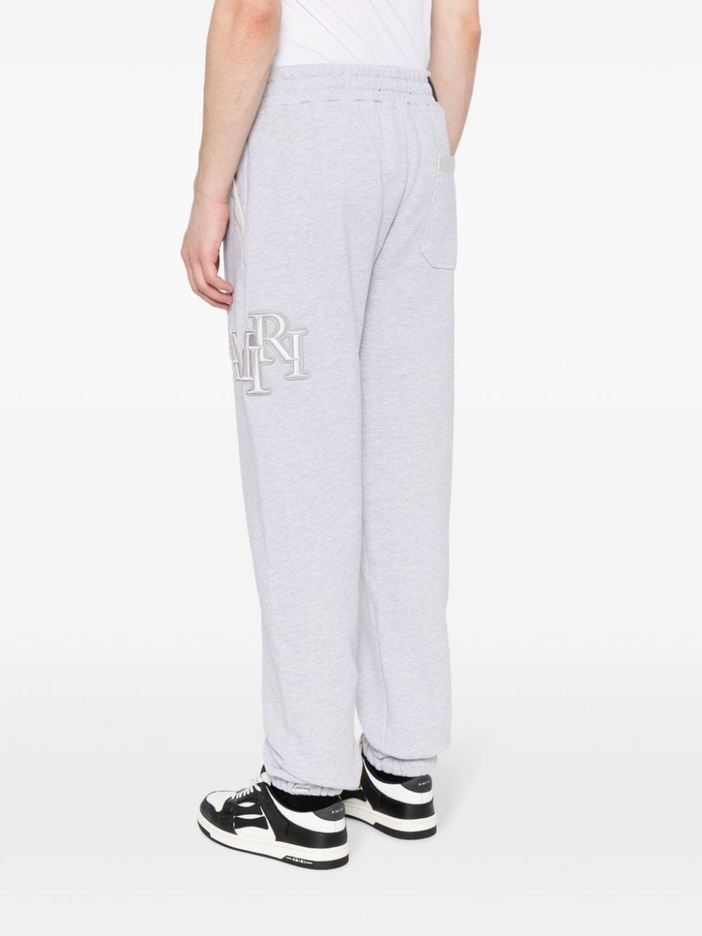 Staggered logo-embroidered track pants - 4