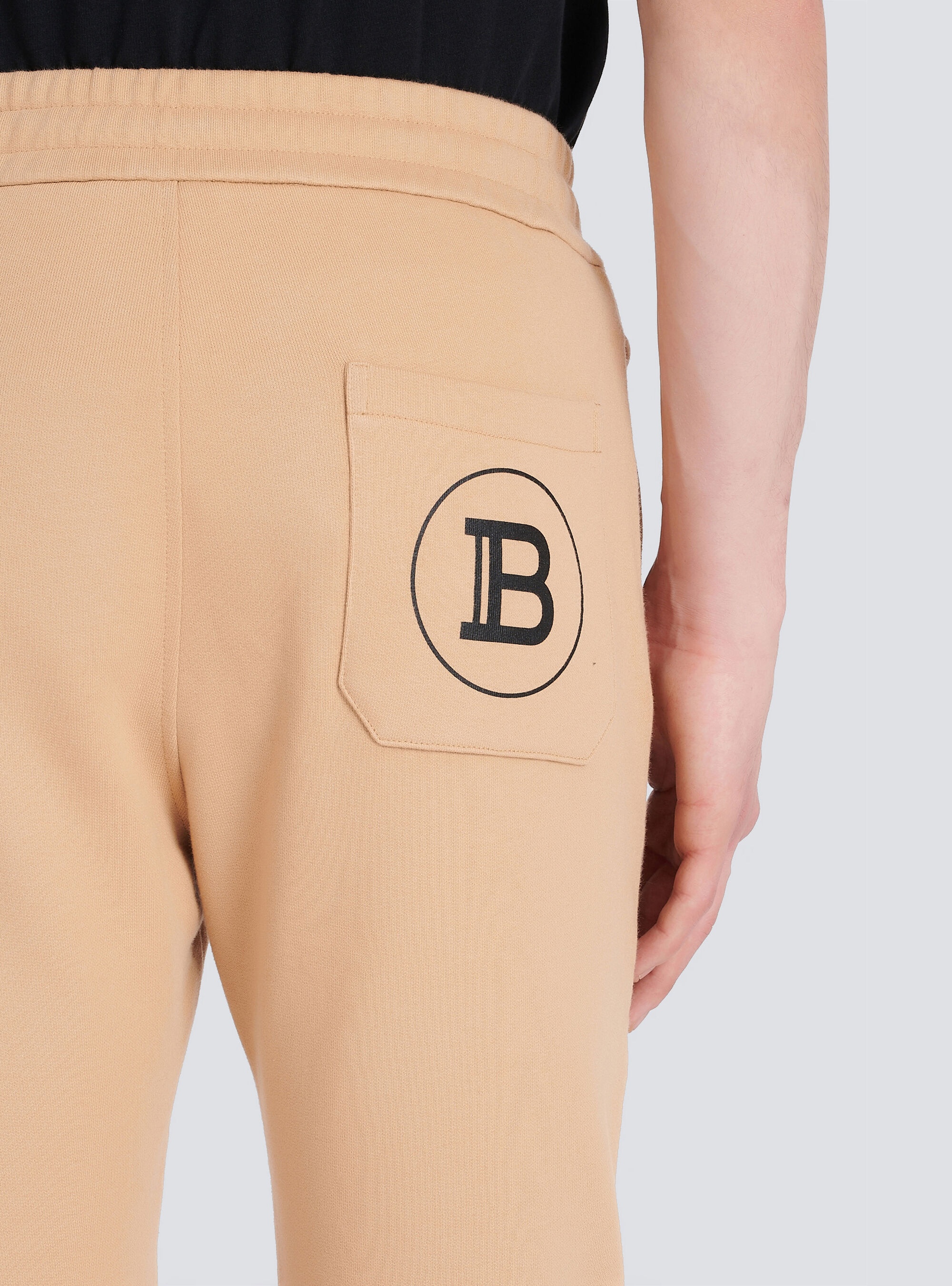 Eco-designed cotton sweatpants with black Balmain logo print - 7