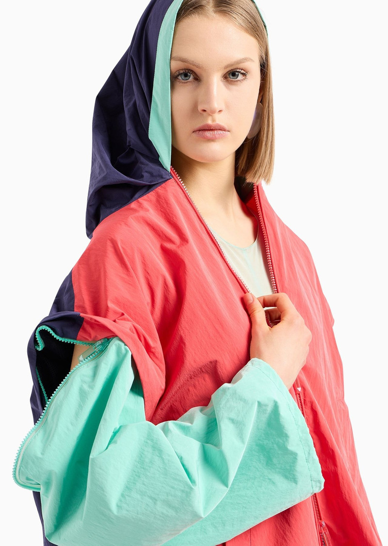 Water-repellent technical fabric blouson with detachable sleeves and godet pleat 6