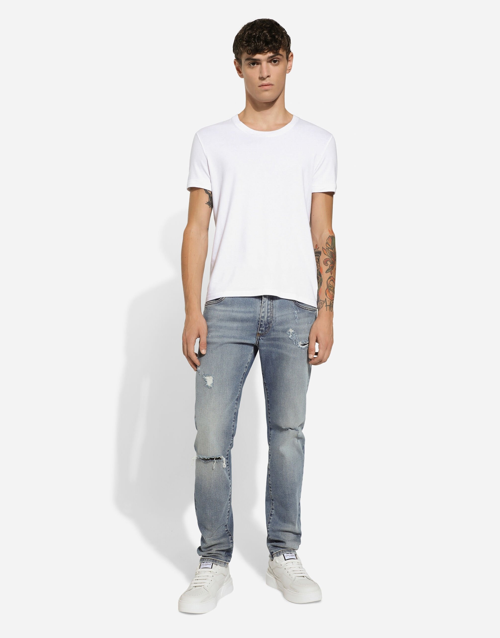 Slim-fit blue stretch denim jeans with abrasions - 2