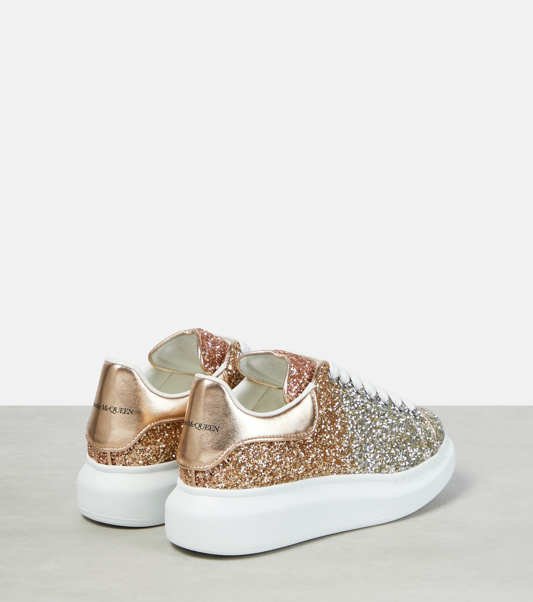 Alexander McQueen Oversized glitter sneakers mytheresa REVERSIBLE