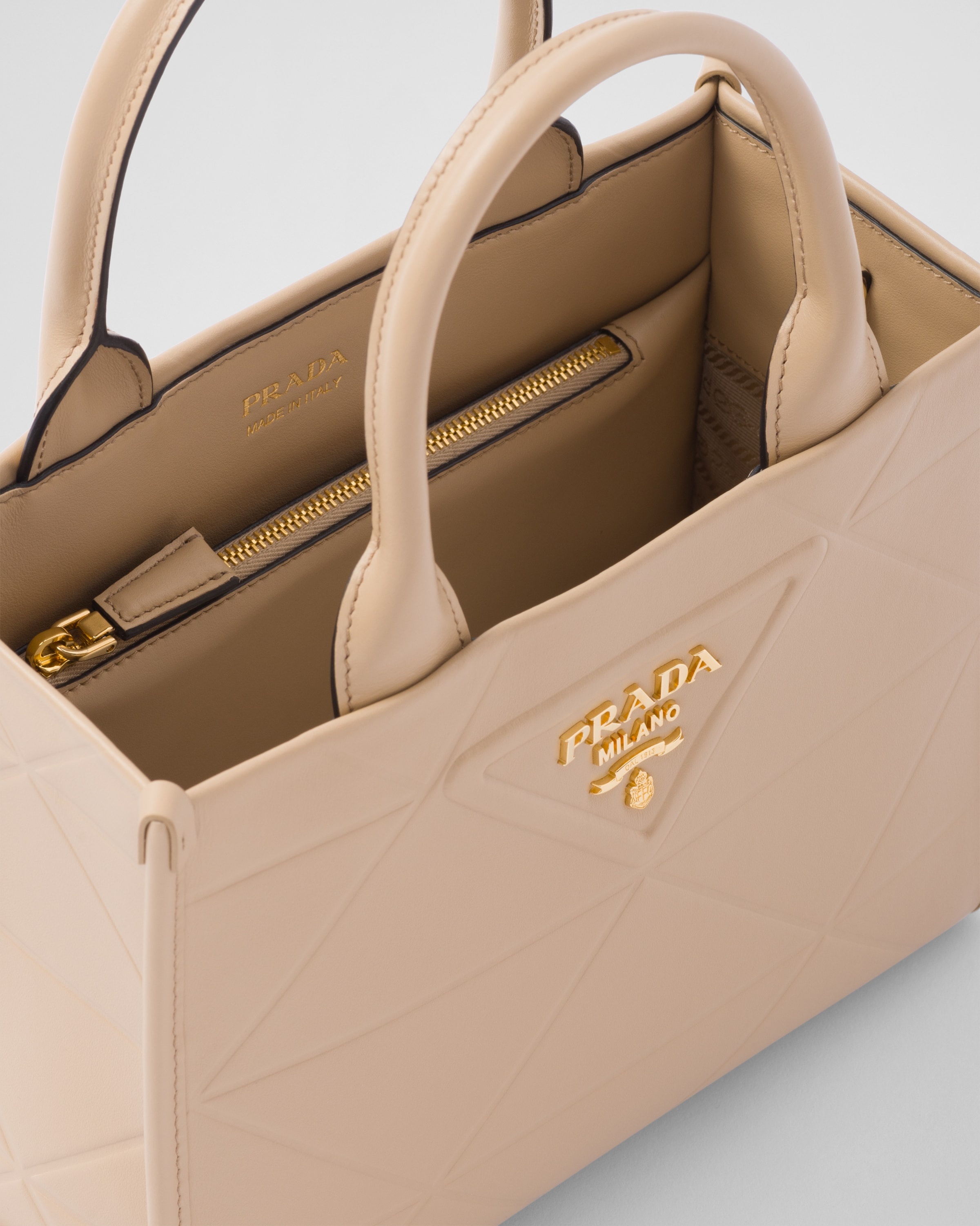 Symbole Leather Mini Bag in Beige - Prada