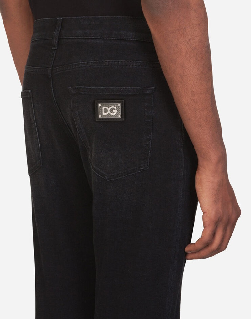 Washed black slim-fit stretch jeans with patch detailing 5