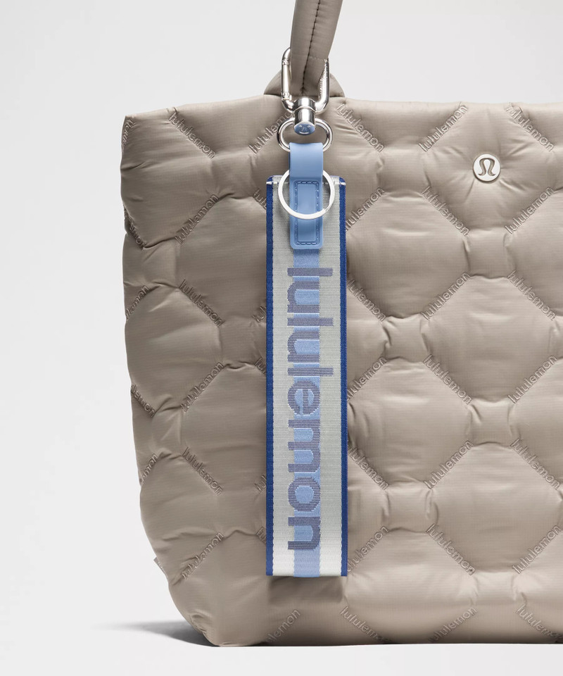 lululemon Never Lost Keychain *Wordmark outlook