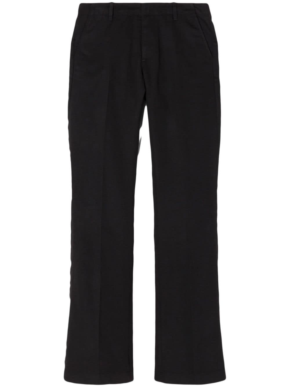 pressed-crease cotton-blend flared trousers - 1