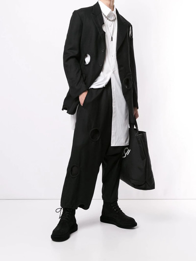 Yohji Yamamoto circle cut-out detail loose cropped trousers outlook