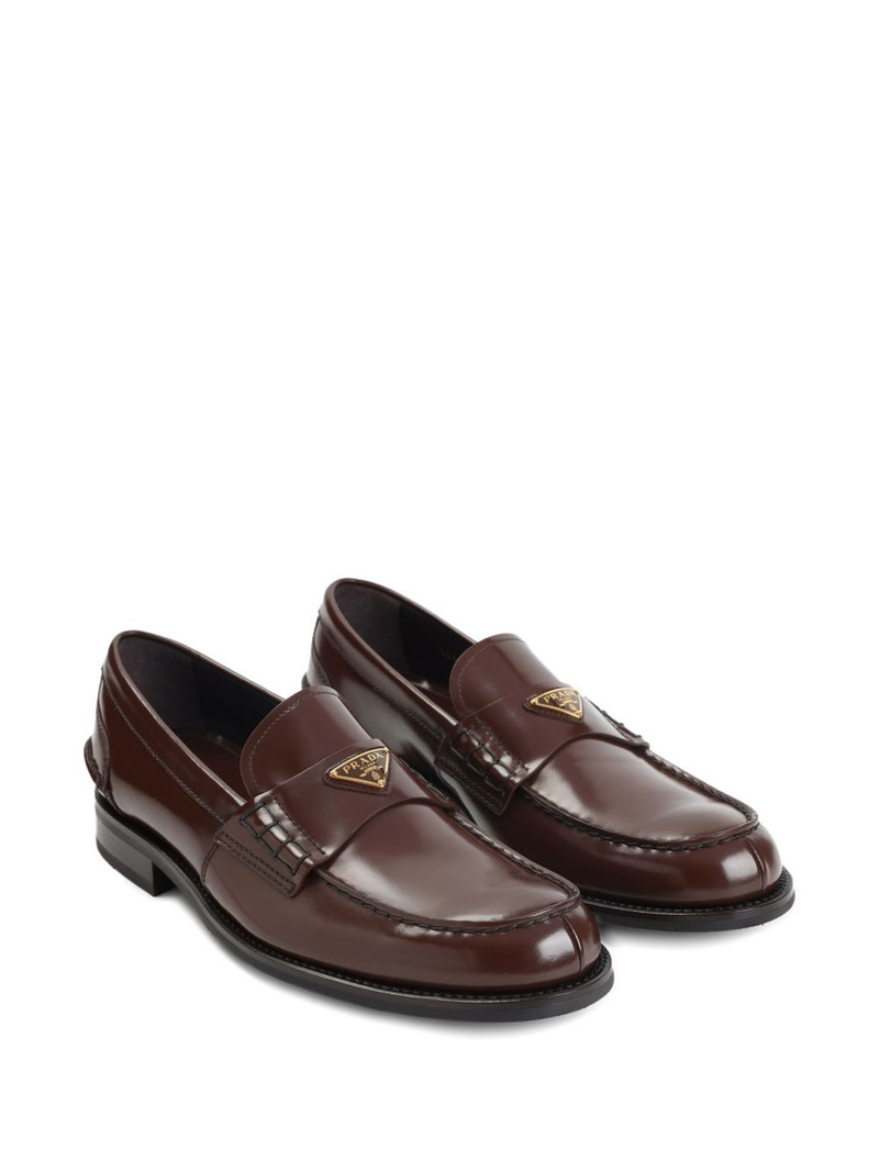 Prada leather logo-plaque loafers outlook