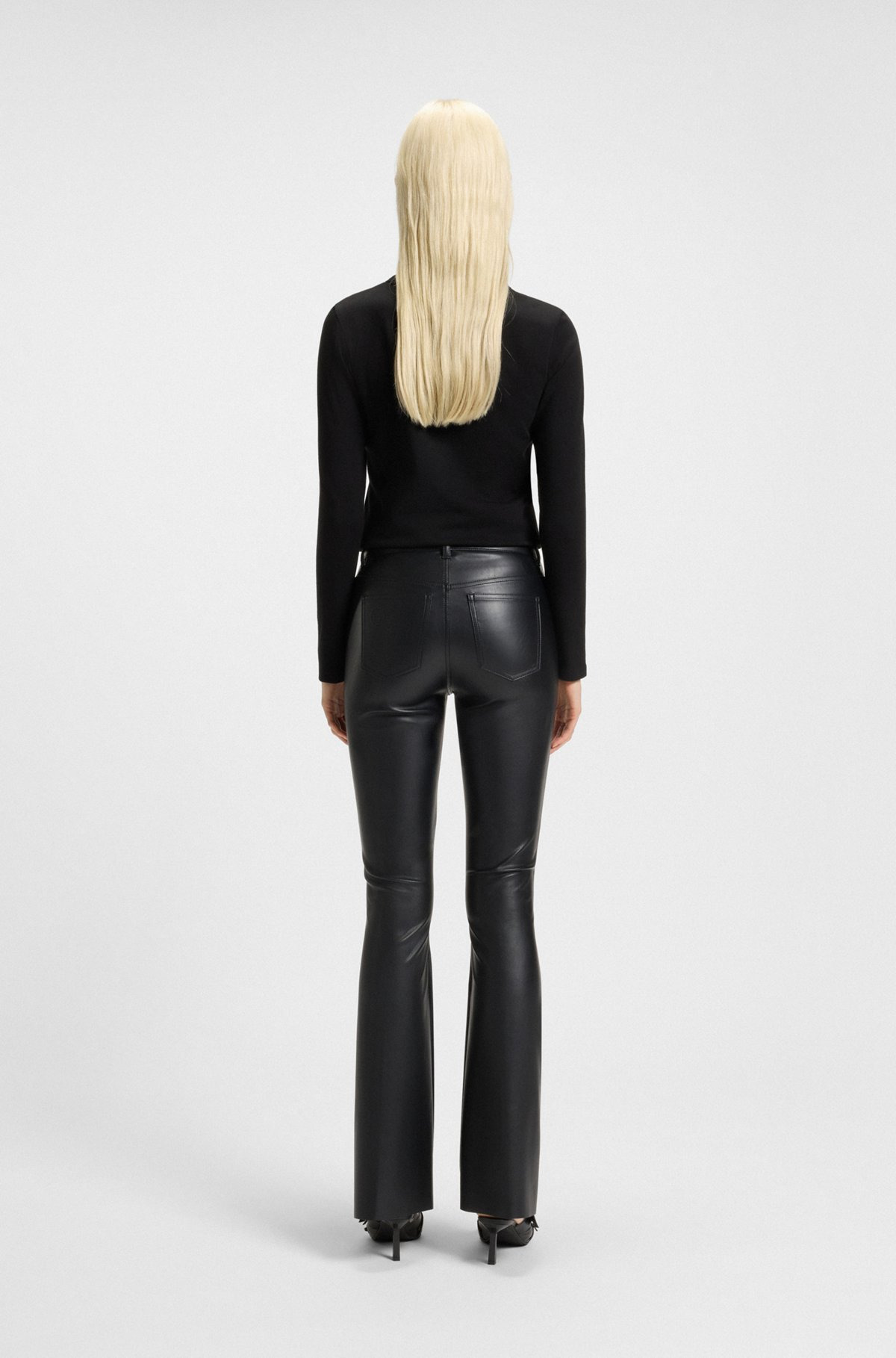 FAUX-LEATHER TROUSERS WITH FLARED LEG - 4