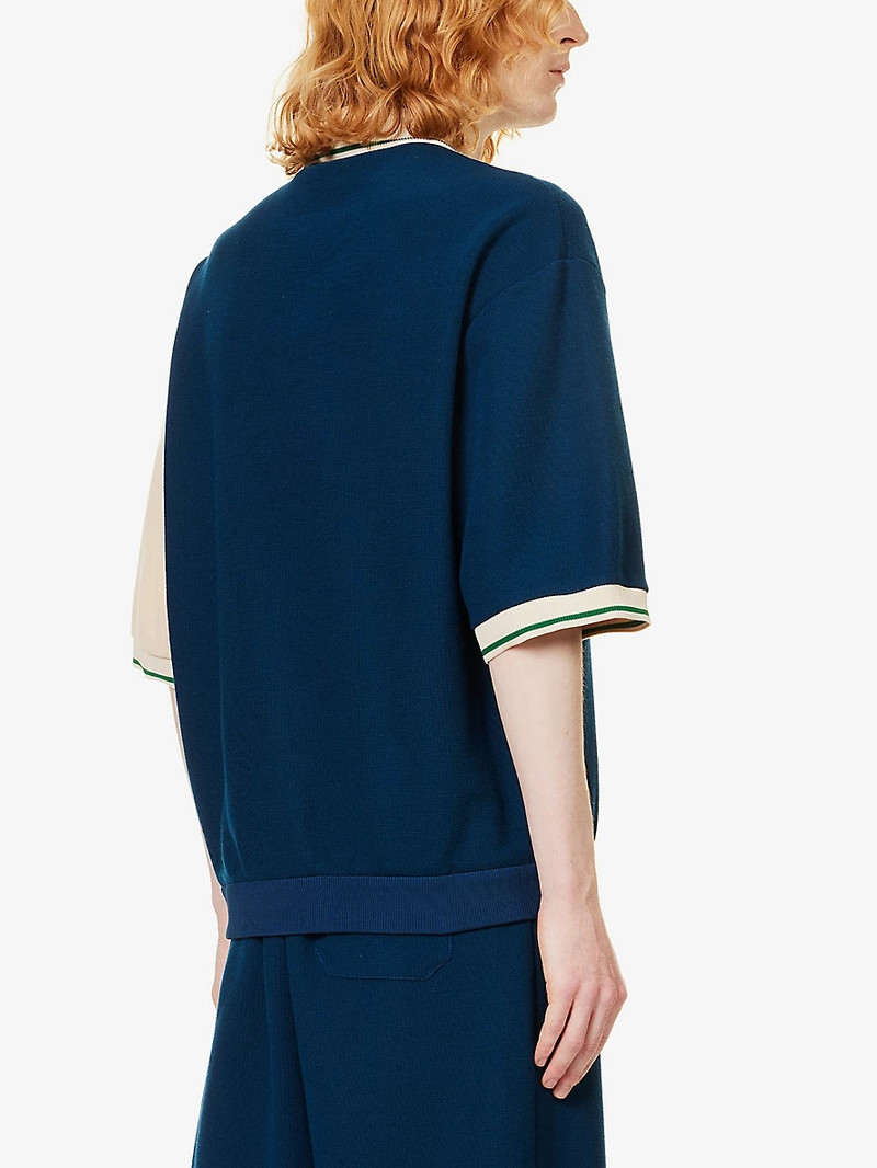 Logo-patch striped wool and cotton-blend polo shirt 4