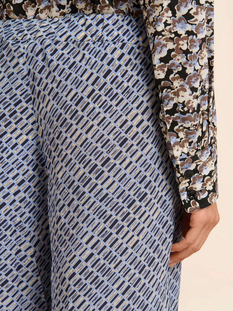 BLUE CRÊPE DE CHINE PANTS WITH CRISS CROSS PRINT 4