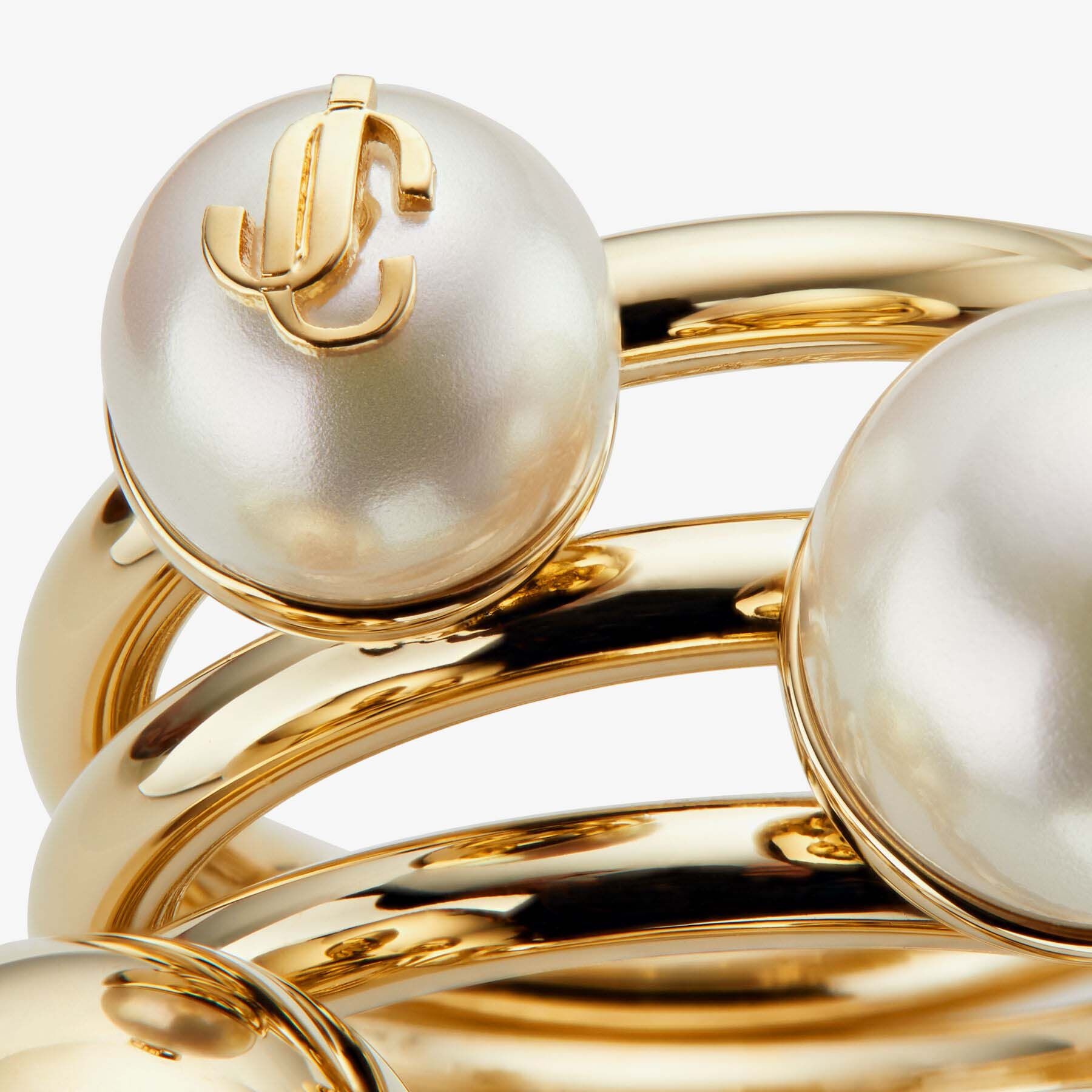 JC Multi Pearl Ring
Gold-Finish Metal Ring with Pearls - 4