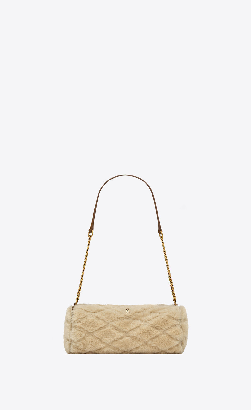 sade mini tube bag in quilted shearling and suede 1