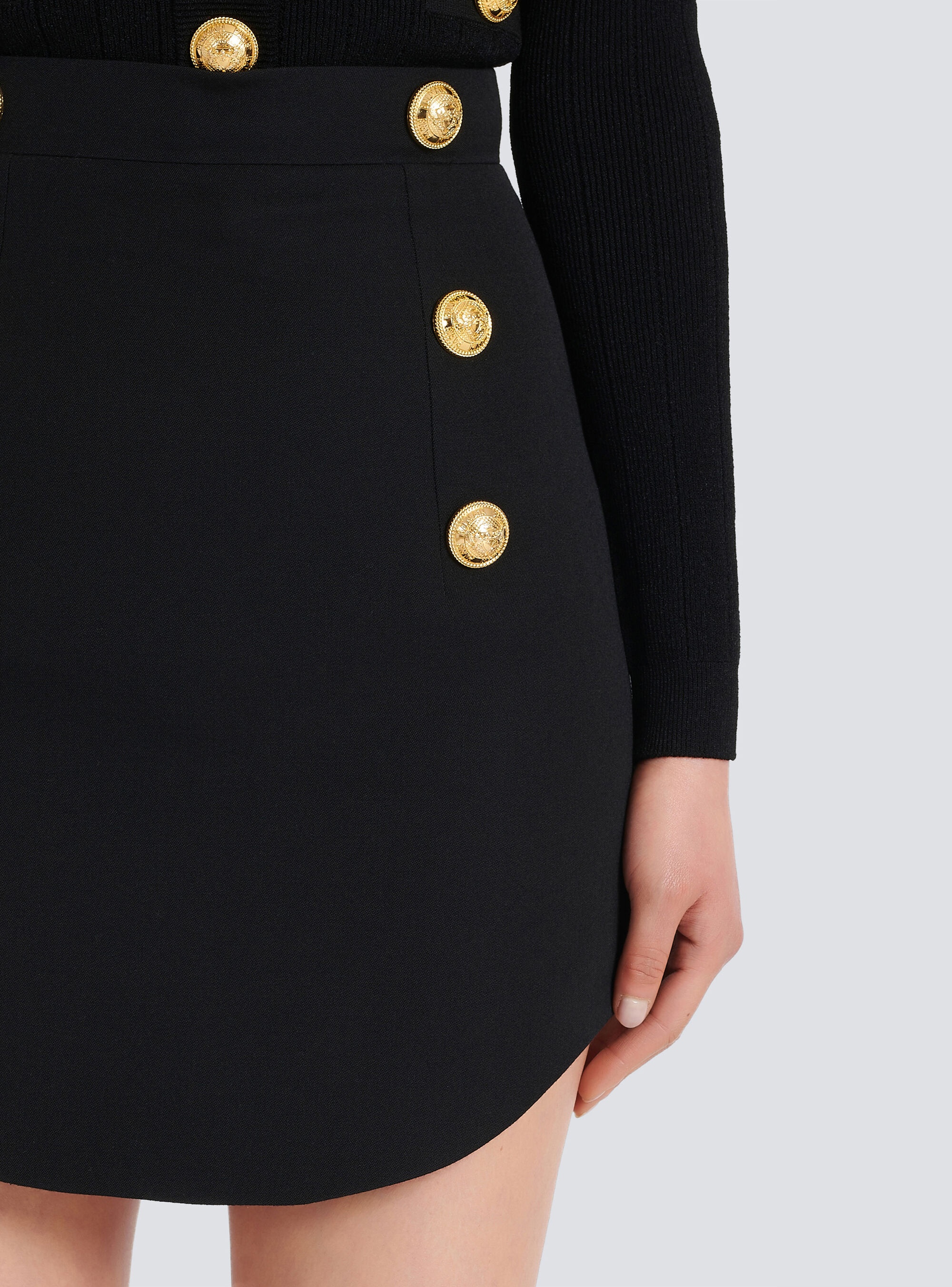 Short knit high-waisted skirt with double-buttoned fastening - 7