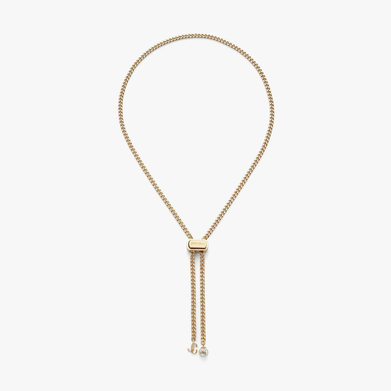 Bon Bon Necklace
Gold-Finish Metal Necklace with Pearl and JC Charm 1