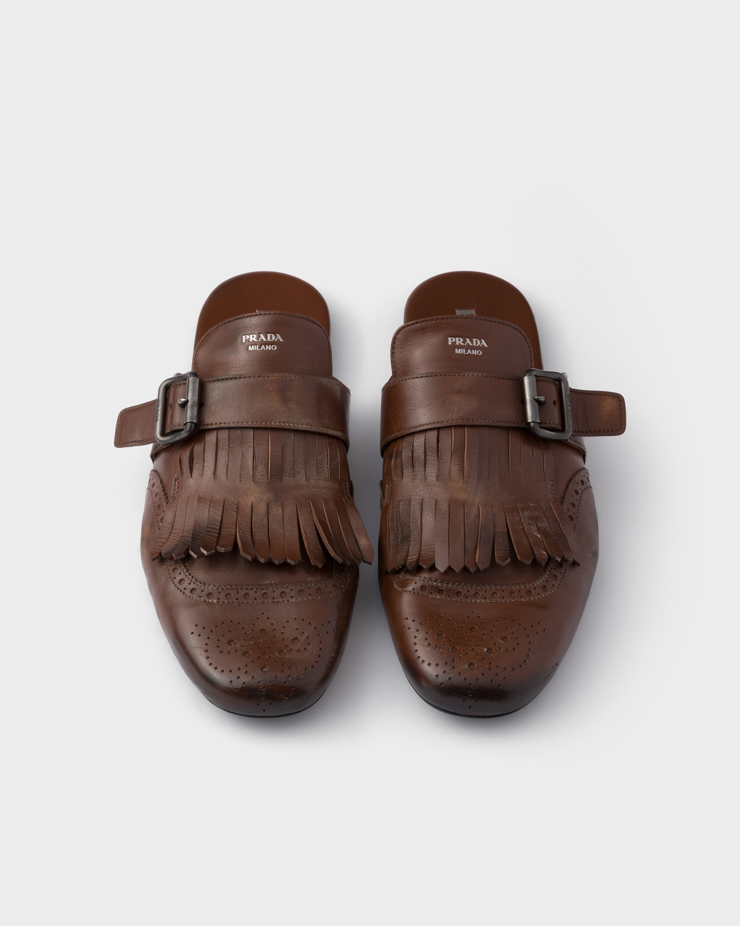 Shuffle antiqued leather mules with buckled strap and fringe - 4