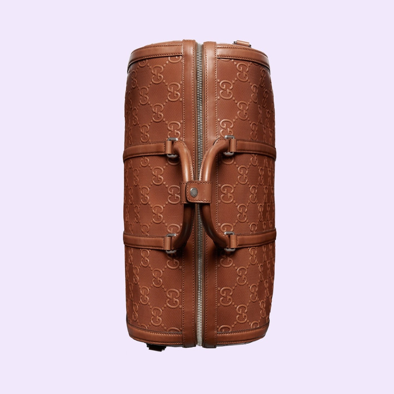 GG embossed duffle bag 7