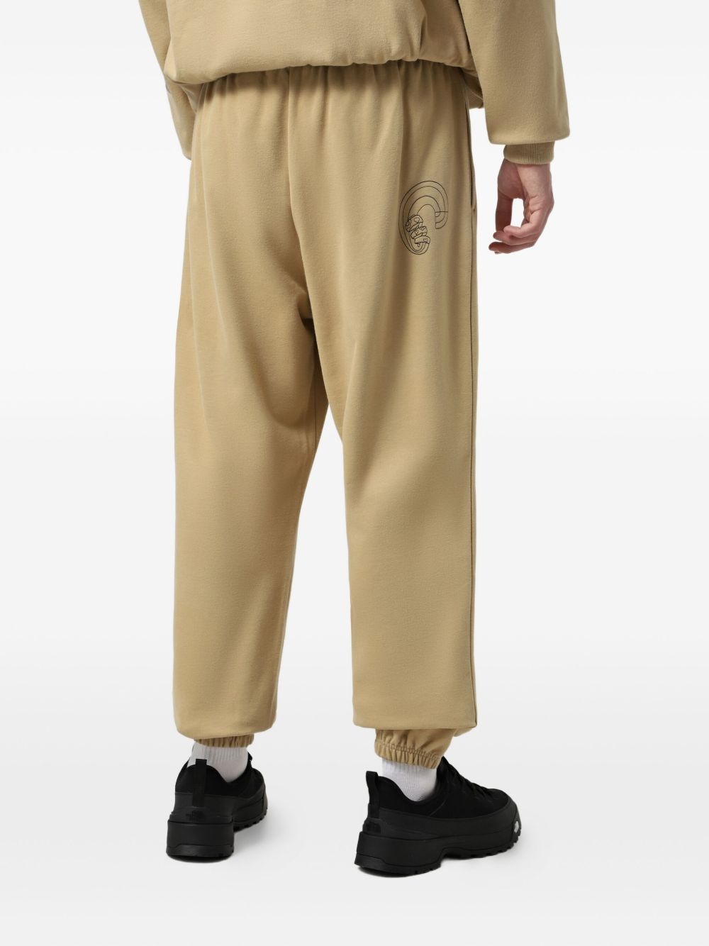 Mountain Cleanup graphic-print track pants - 4