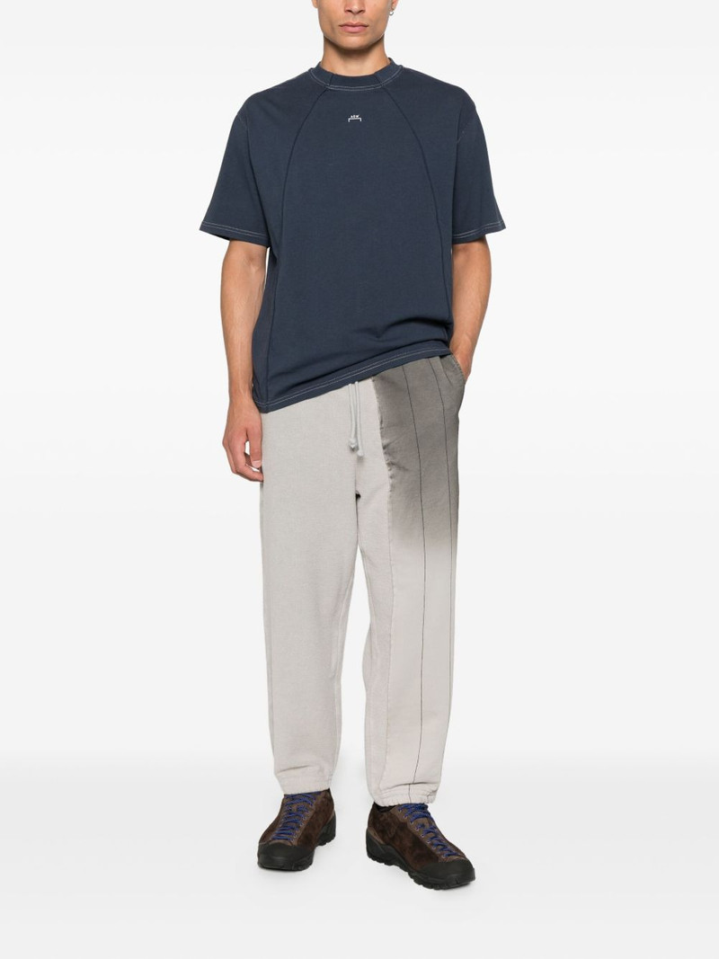 A-COLD-WALL* ombré panelled track pants outlook