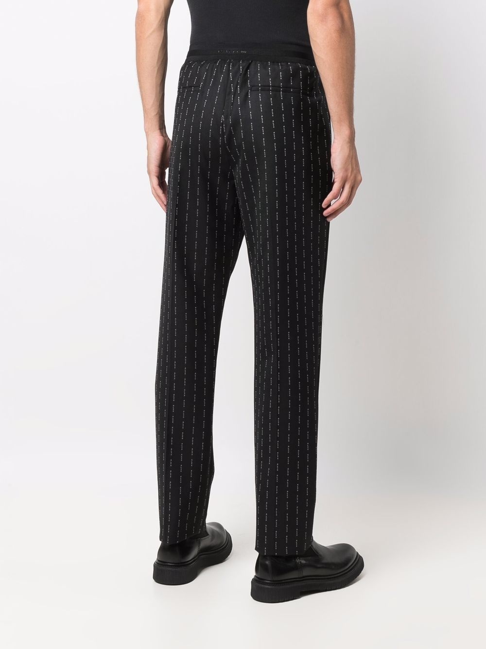 logo-pinstriped tailored trousers - 4