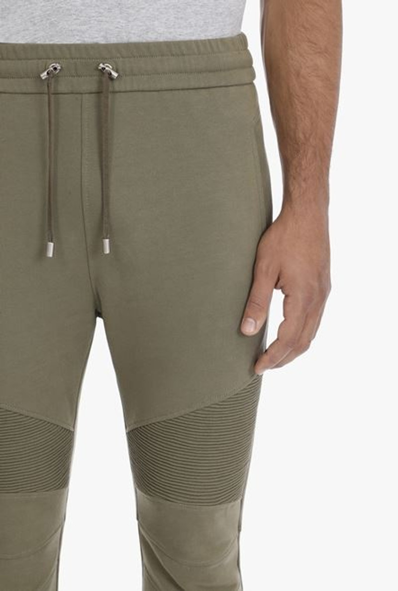 Olive green sustainable cotton sweatpants with white Balmain Paris logo 8