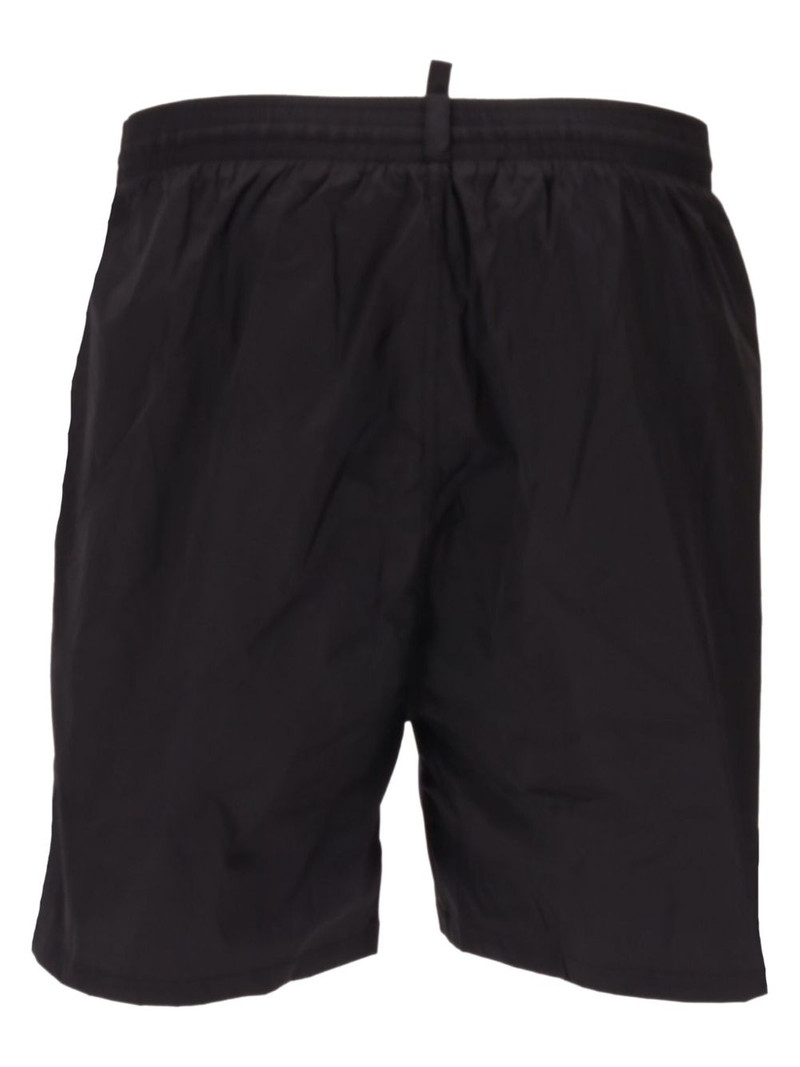 DSQUARED2 logo-print swim shorts outlook