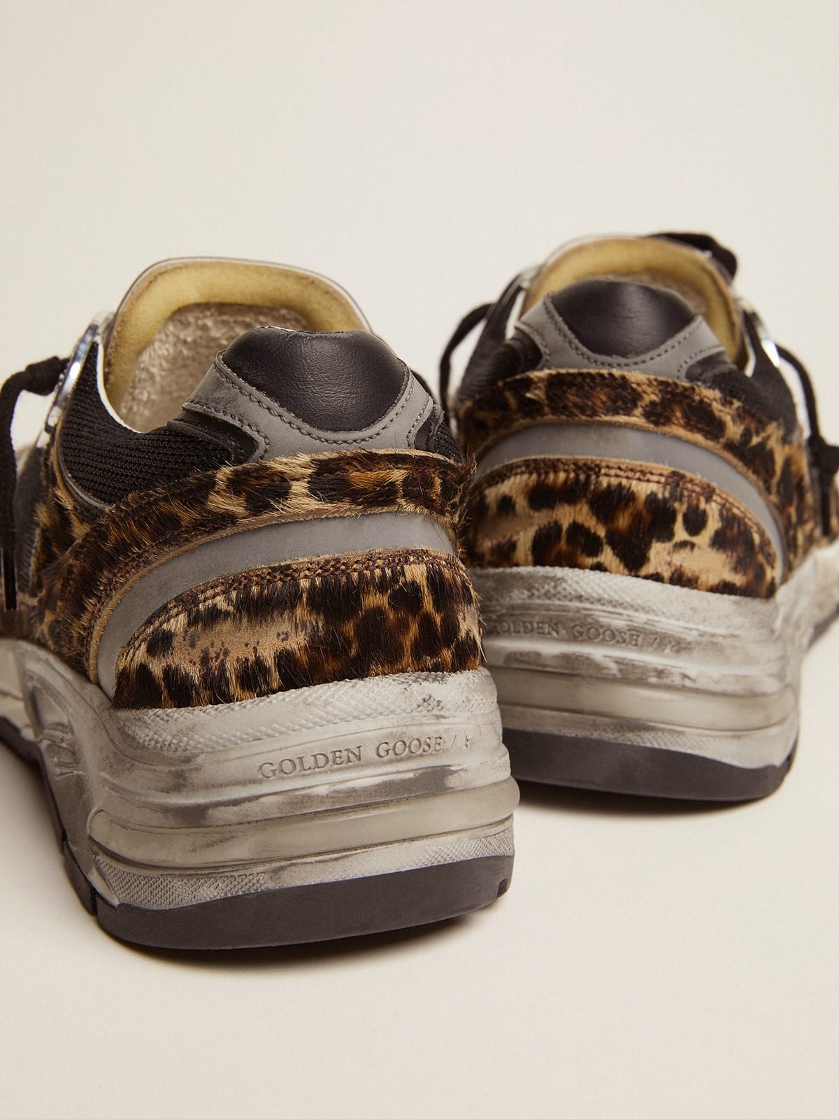 Golden Goose Women\'s Dad-Star sneakers in leopard-print pony skin |  REVERSIBLE