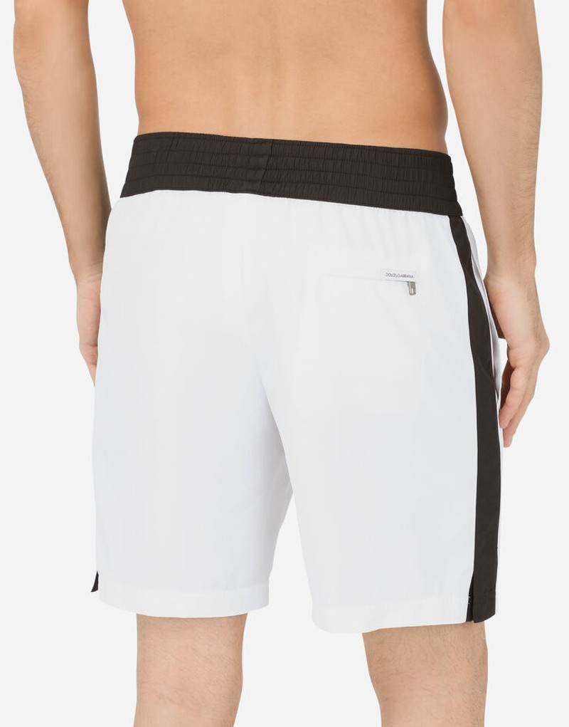 Dolce & Gabbana Two-tone mid-length swim trunks with DG patch outlook