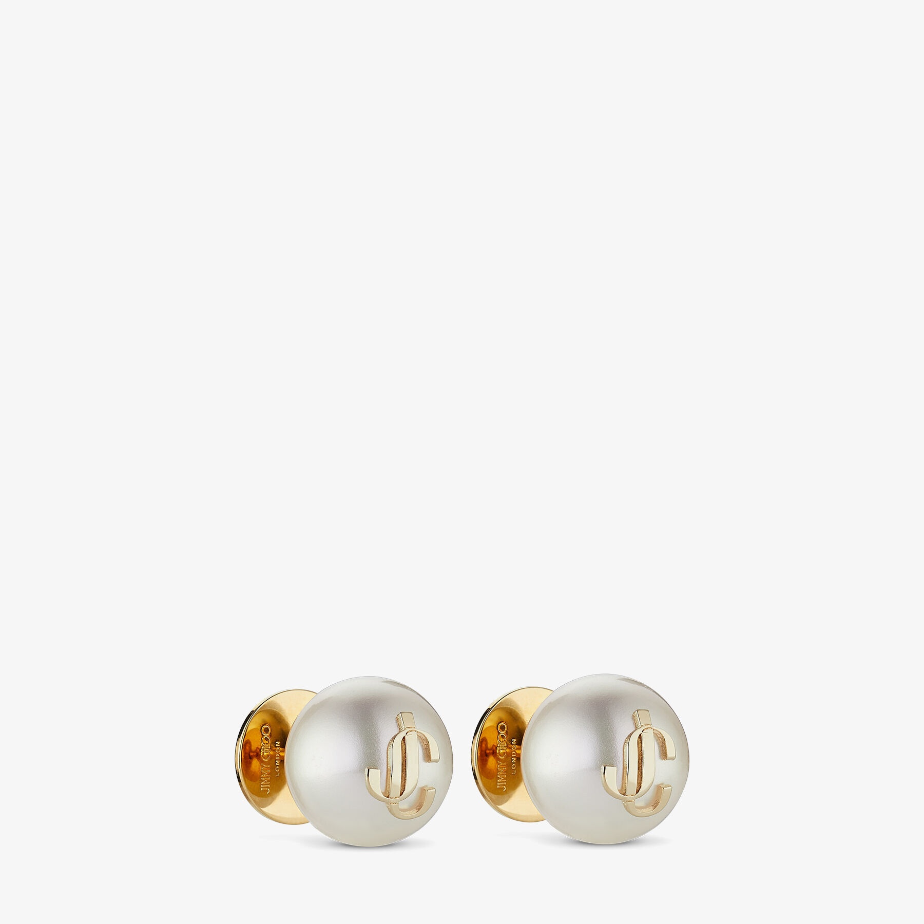 JC Pearl Studs
Gold-Finish Metal JC Pearl Stud Earrings - 2