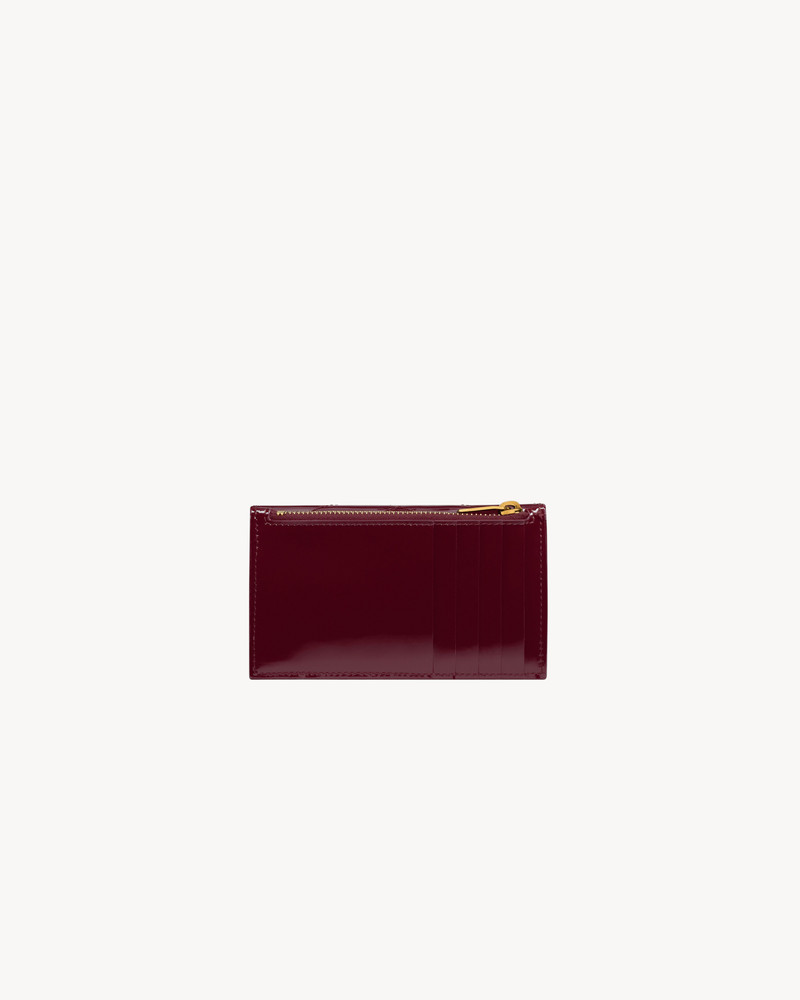 SAINT LAURENT CASSANDRE MATELASSÉ FRAGMENTS FLAP CARD CASE IN PATENT LEATHER outlook