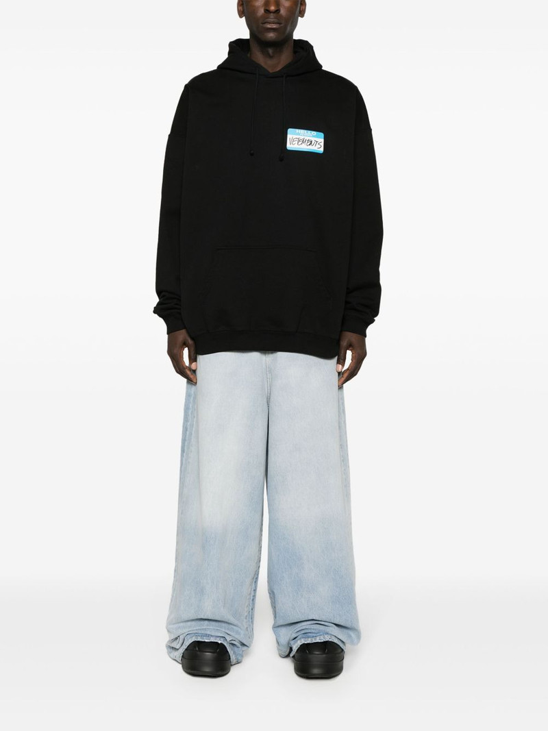 VETEMENTS Name-tag printed hoodie outlook