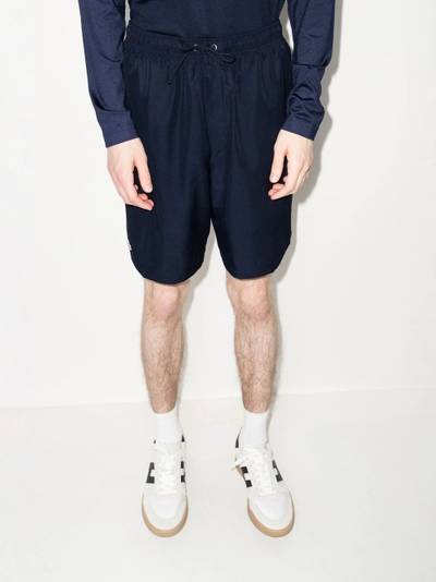 LACOSTE logo-embroidered track shorts outlook