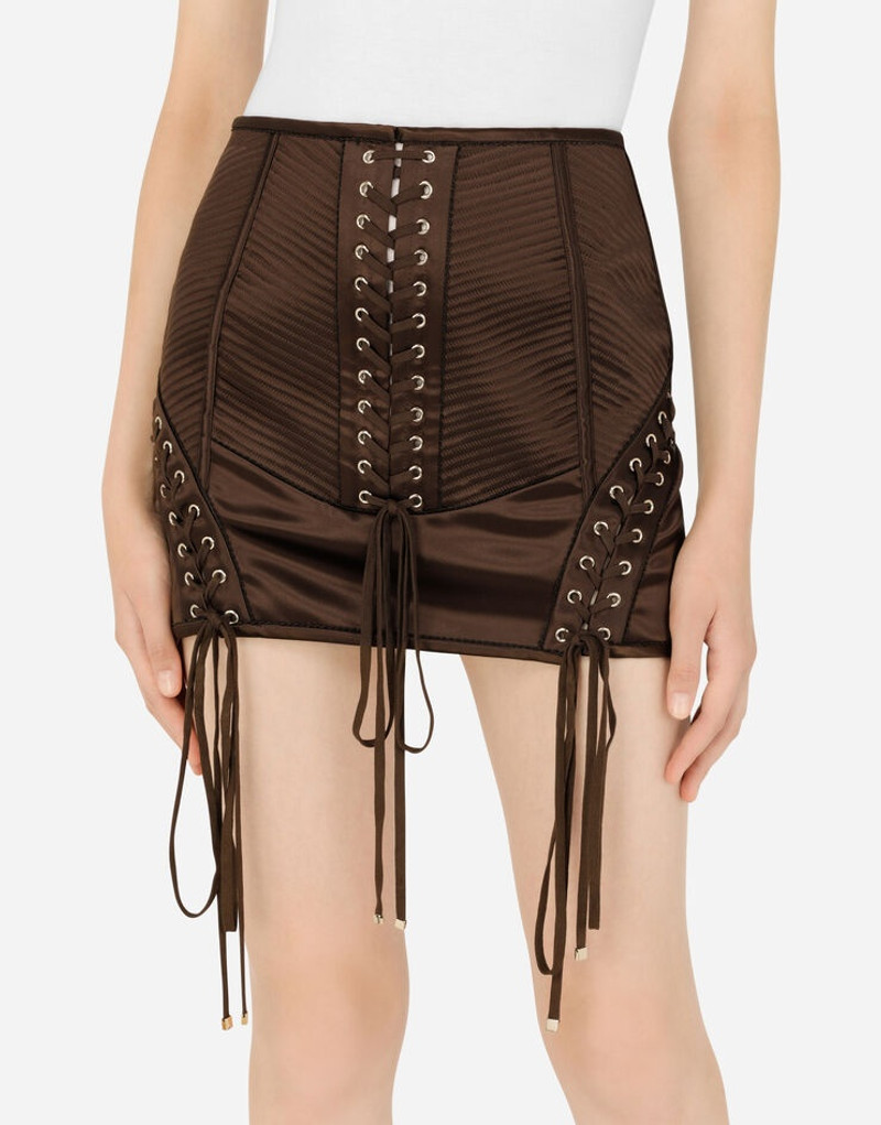 Satin miniskirt with laces and eyelets 4