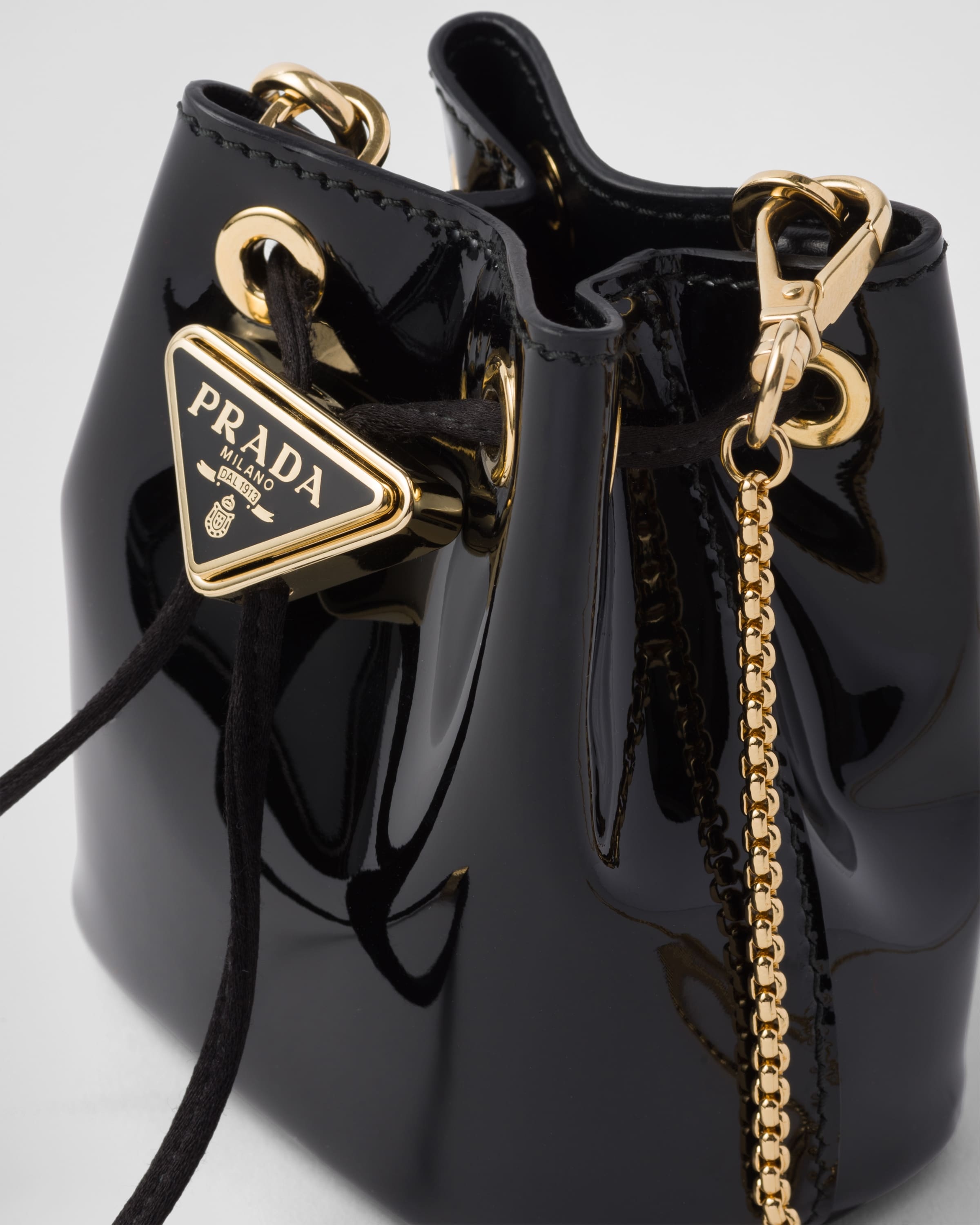 Prada Mini Patent-Leather Pouch | saksfifthavenue | REVERSIBLE
