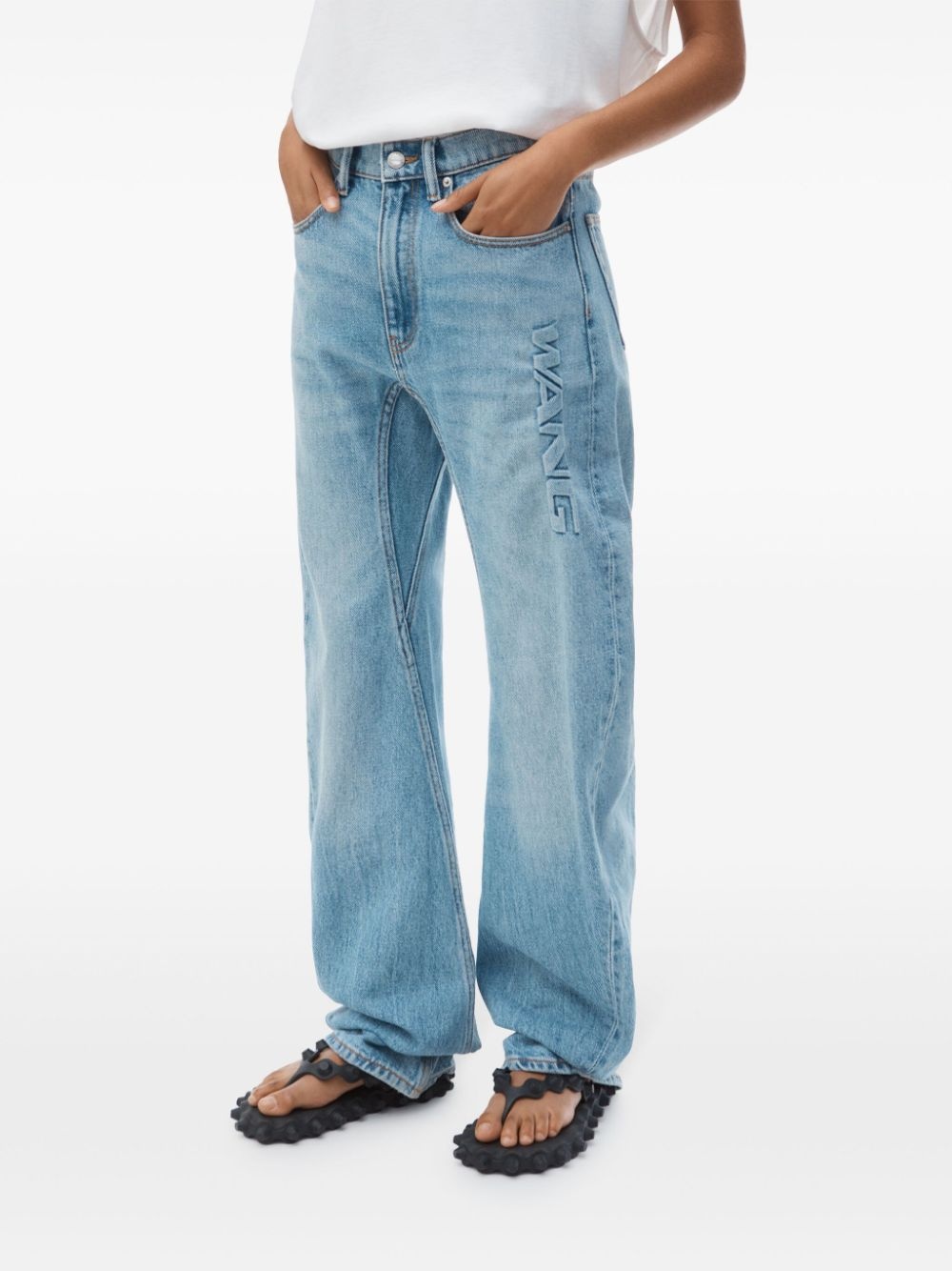logo-embossed jeans - 4