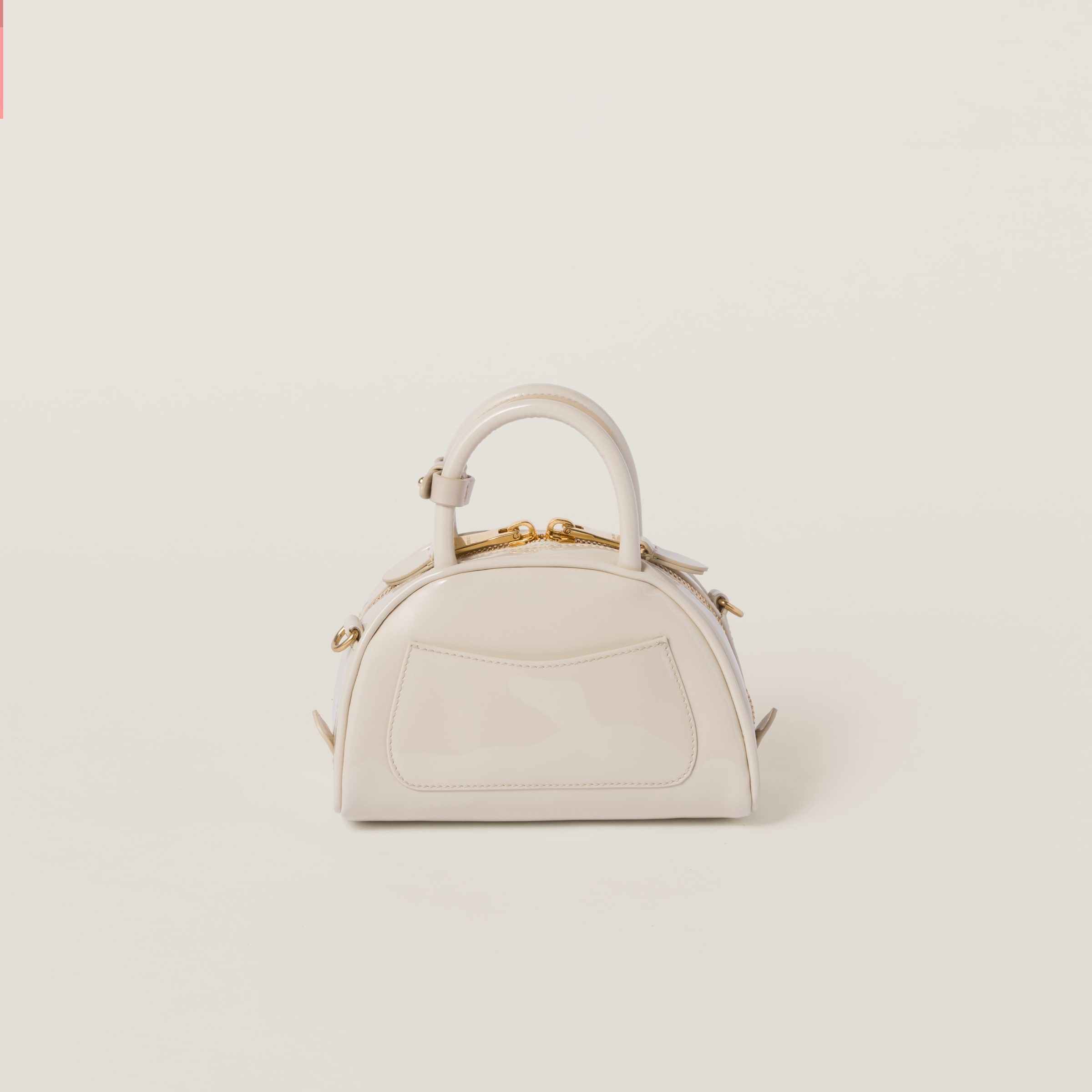 Miu Miu Patent leather top-handle bag | REVERSIBLE