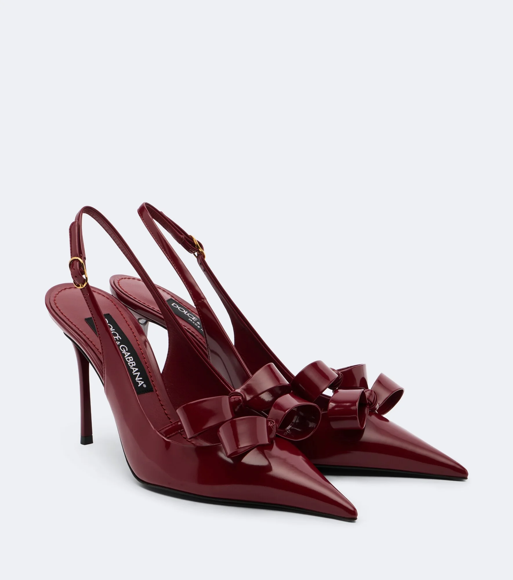 Bow-detail patent leather slingback pumps - 1