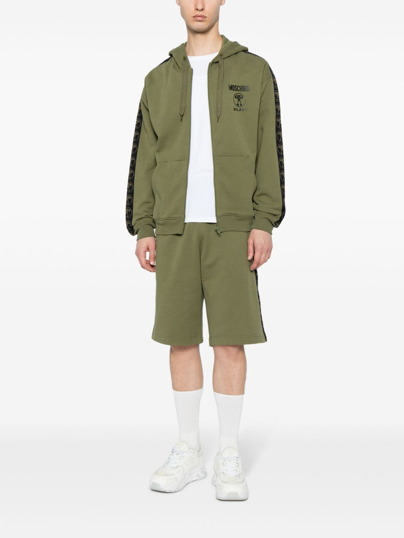 Moschino logo-print organic cotton track shorts outlook