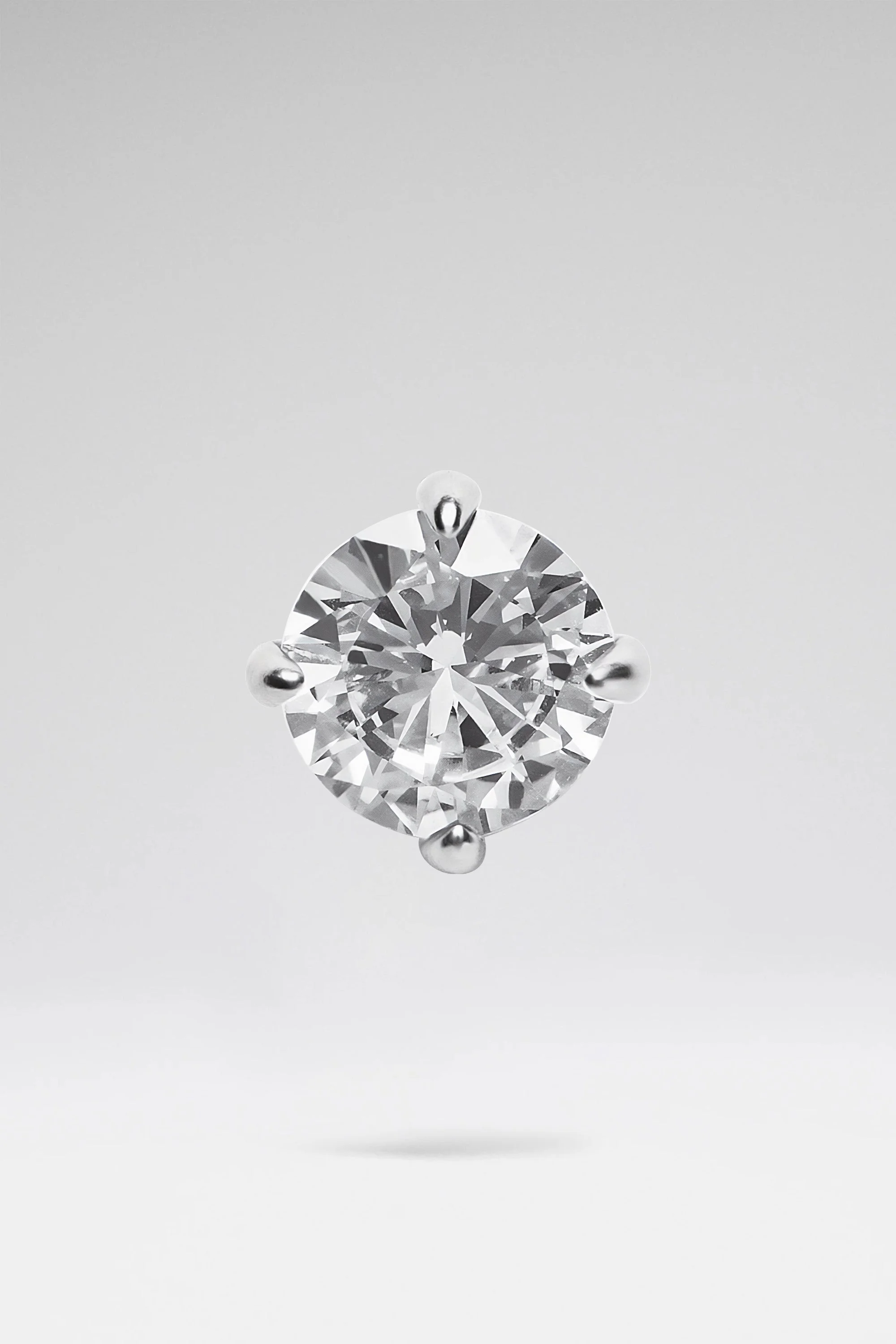 GIGI EARRING STUD WITH WHITE CRYSTAL AND SILVER BASE - 1