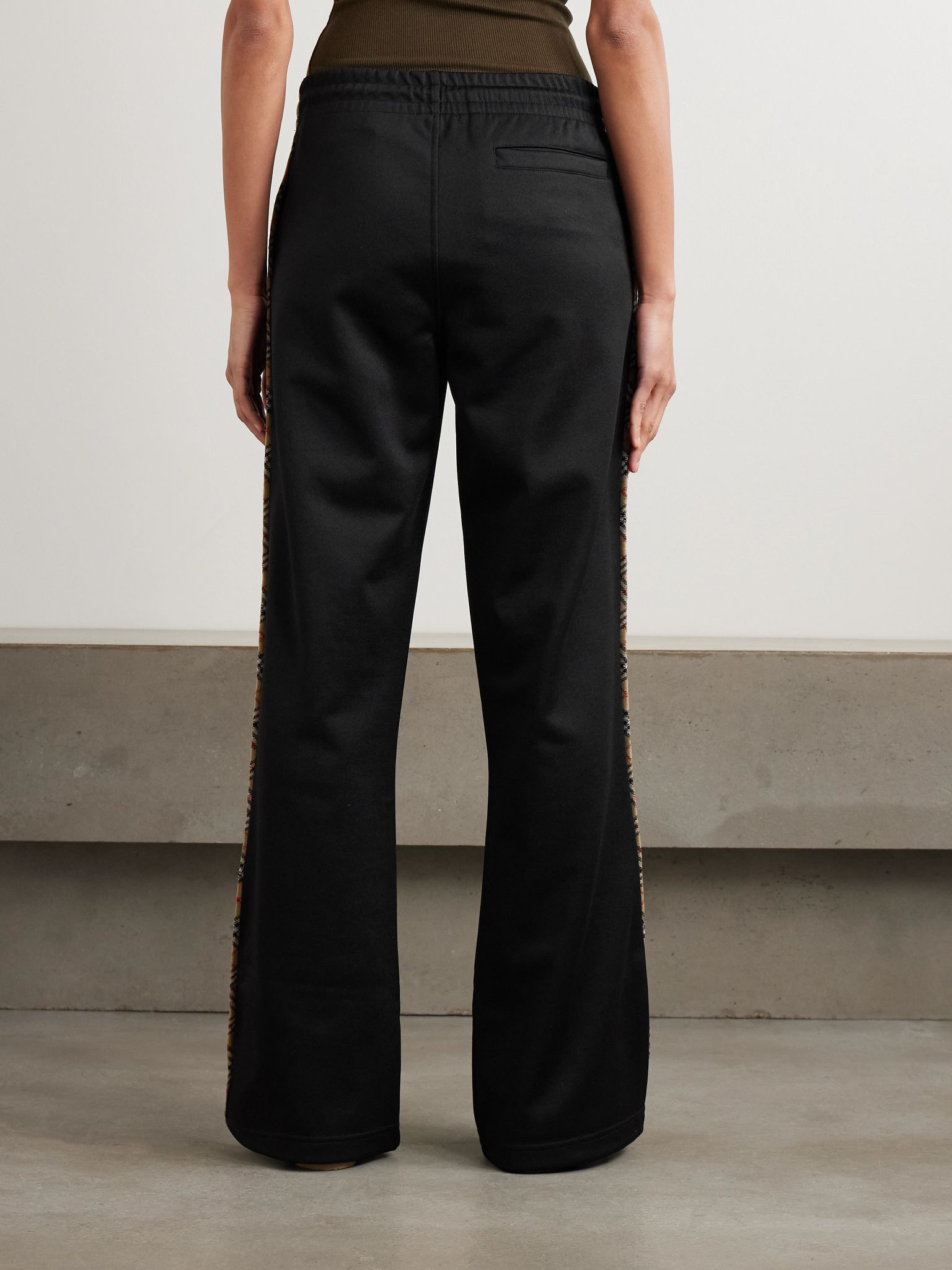 Checked piqué-trimmed jersey flared track pants Black - 4