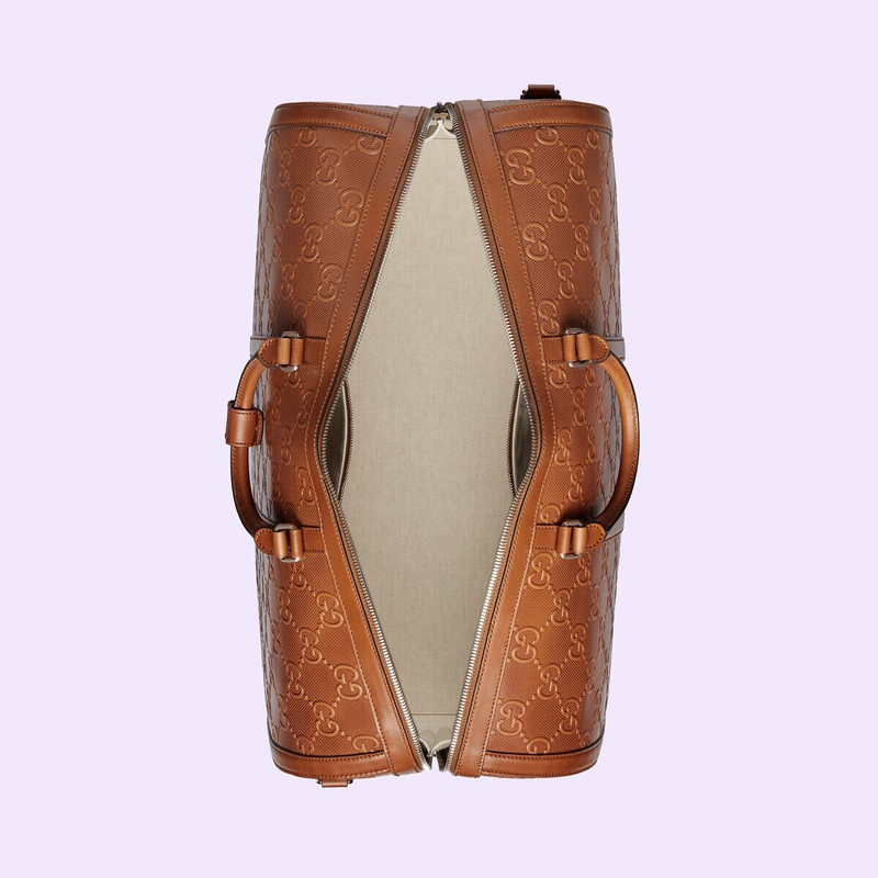GG embossed large duffle bag 8