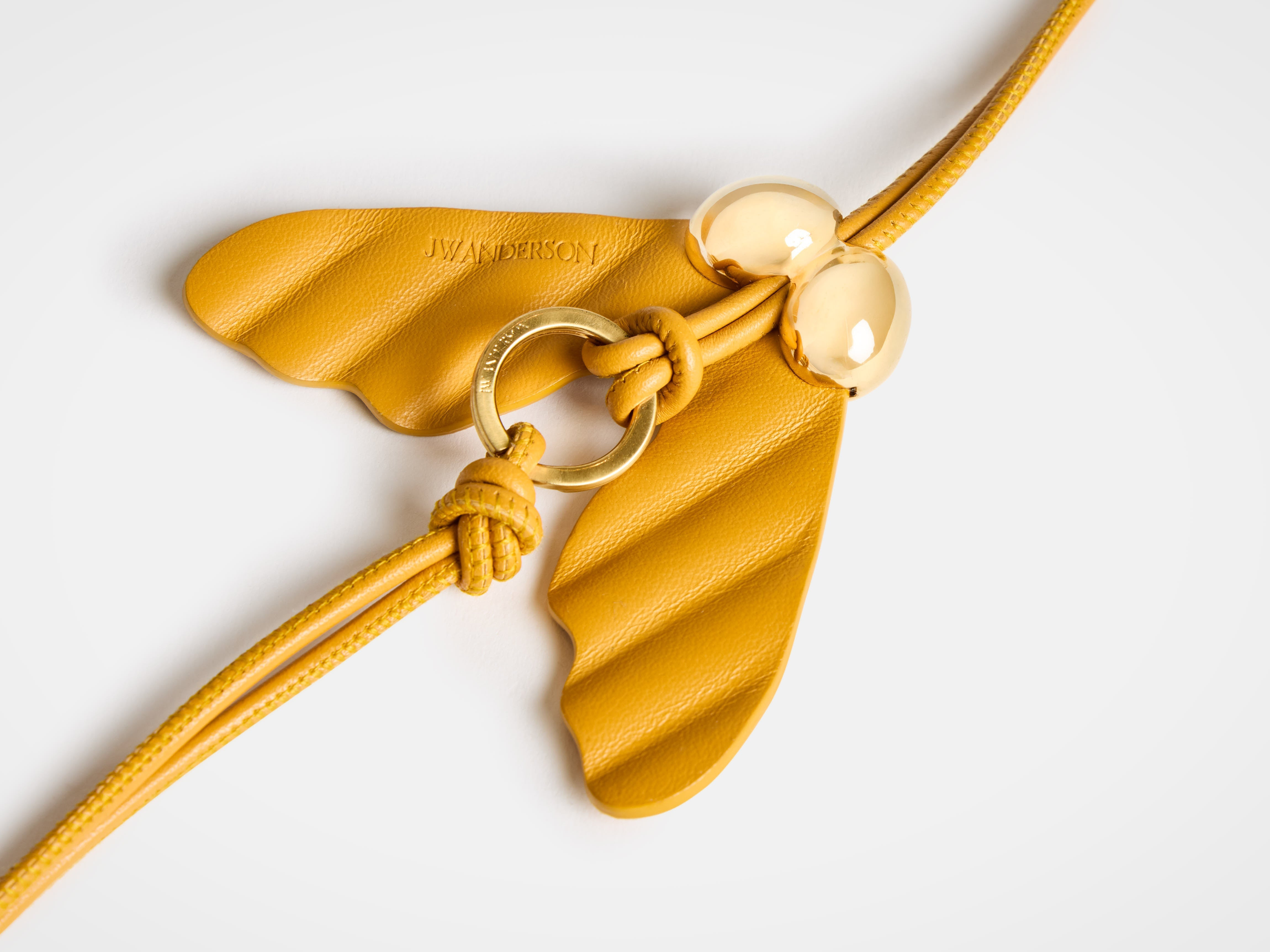 LEATHER HELICOPTER SEED CHARM - 3