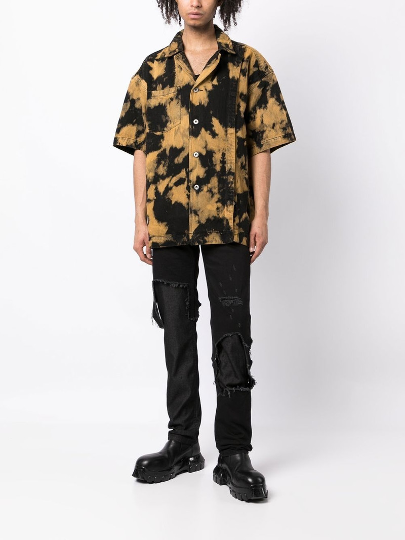 Raf Simons distressed slim-leg jeans outlook