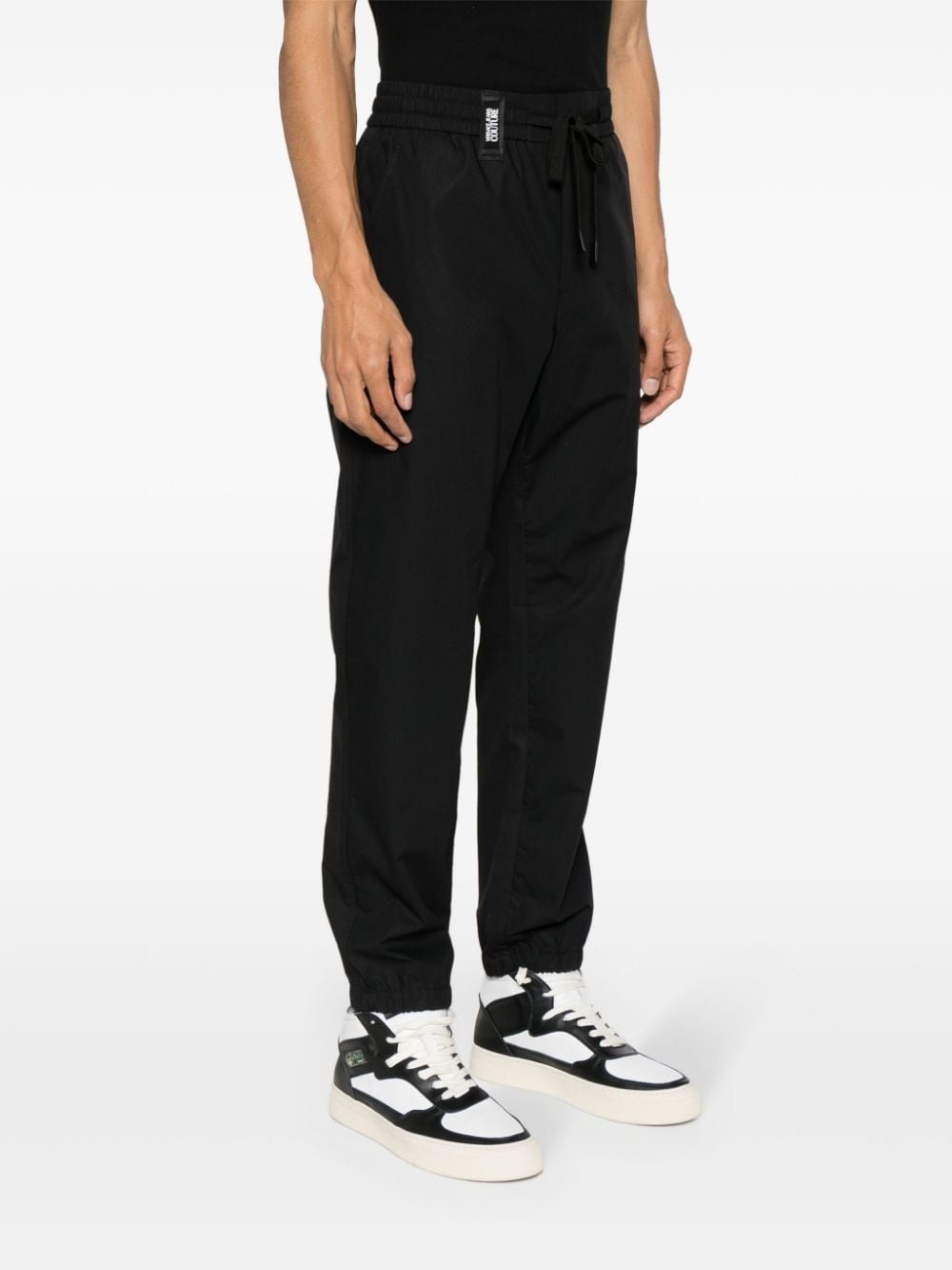 logo-strap tapered-leg trousers - 3