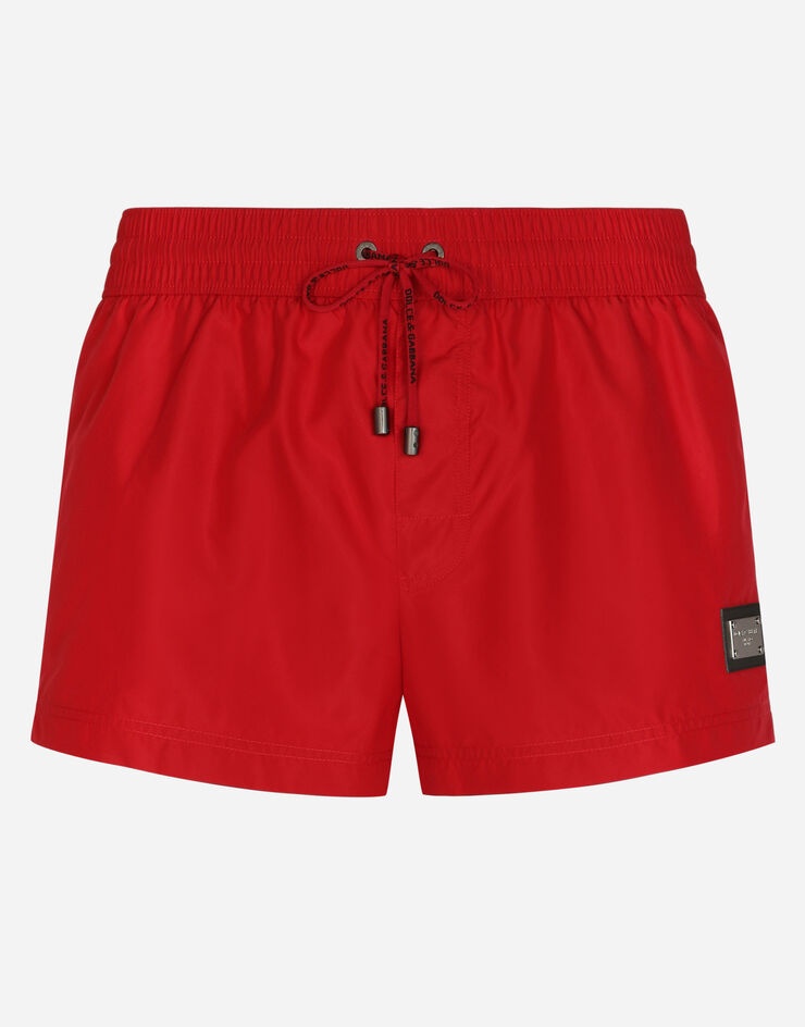 Short swim trunks with branded tag - 1