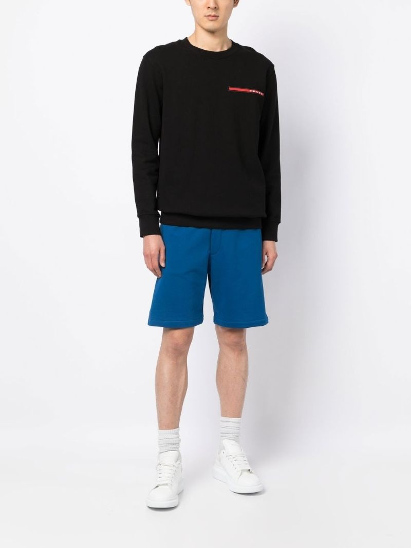 Alexander McQueen logo-tape cotton track shorts outlook