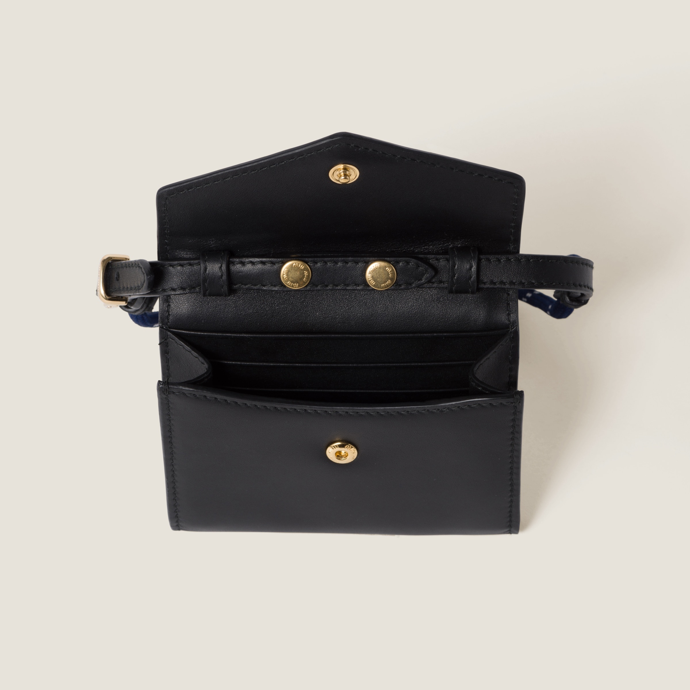 Miu Miu Leather wallet with leather and cord shoulder strap 