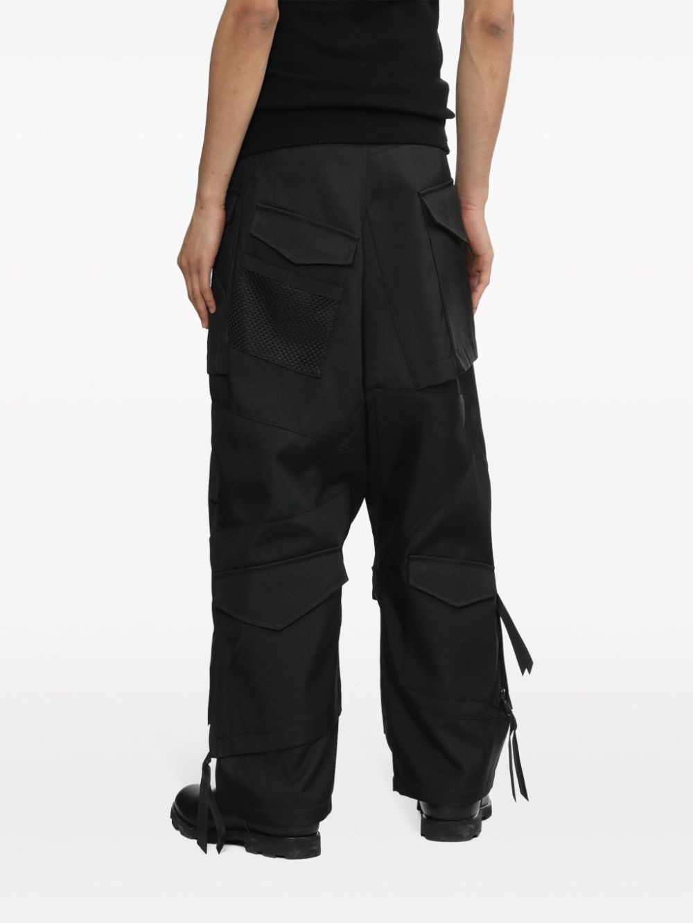strap-detail asymmetric cargo trousers - 4