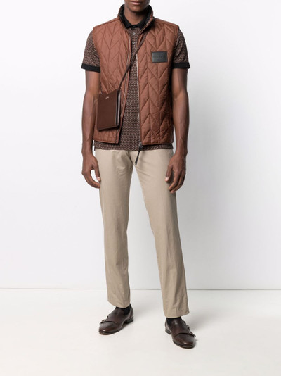 Salvatore Ferragamo logo-patch quilted sleeveless jacket outlook