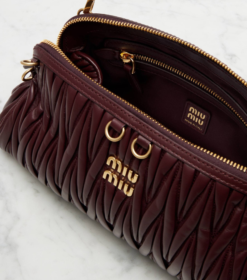 Matelassé leather clutch 3